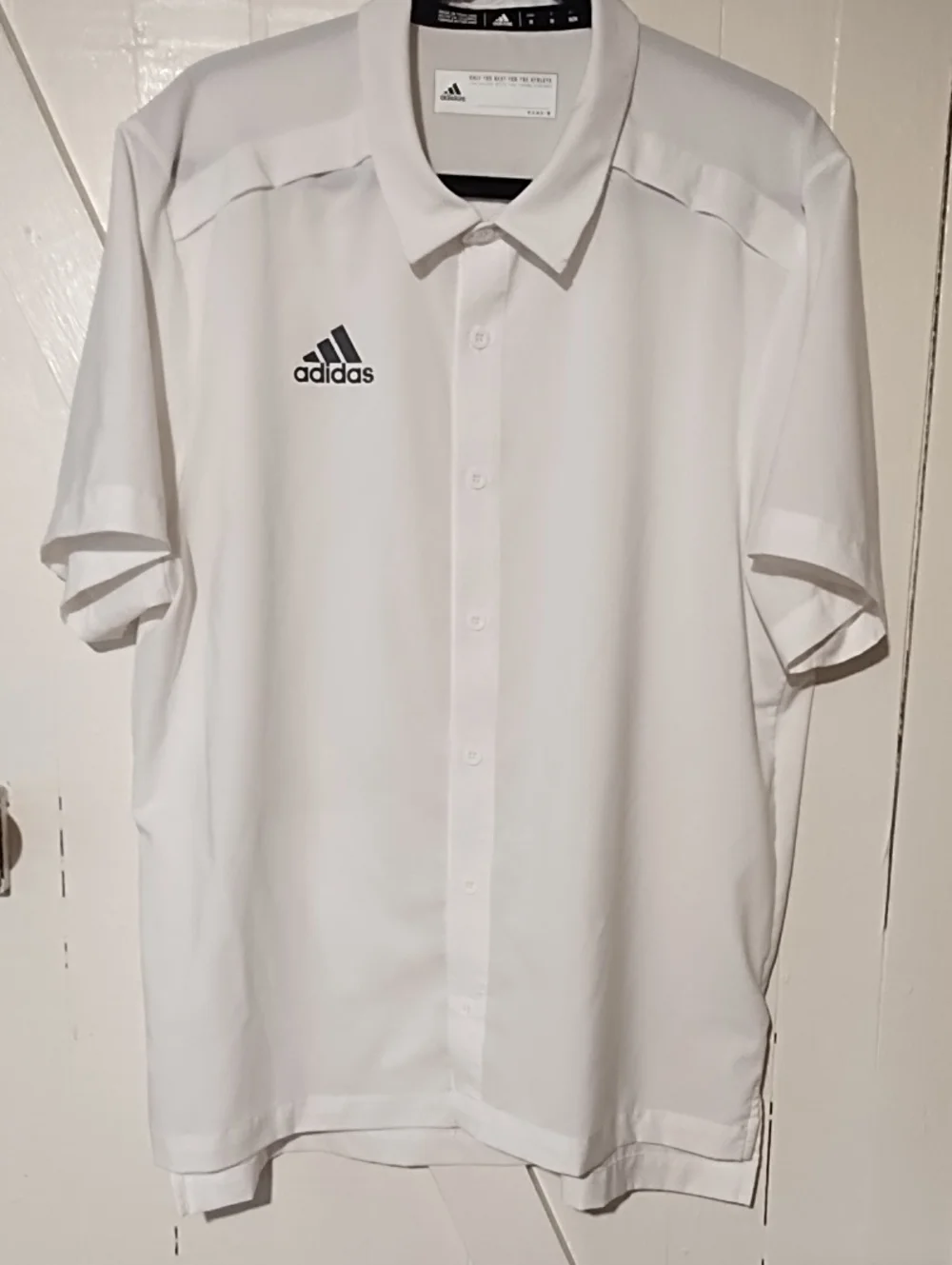 adidas EUC Medium AeroReady White Short-Sleeve Button Shirt with Black Logo.